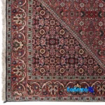 In-room view of Cypressia Handwoven Rug Red room styling and scale