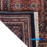 In-room view of Qashqai Handwoven Carpet Traditional Design room styling and scale