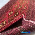 Room setting of Nkpa Handwoven Rug Baloch Design Red floor placement example