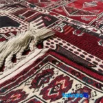 Baloch Handwoven Carpet Red Can be washed by hand or in a dishwasher. floor placement example (Room setting)