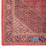 Cypress Handwoven Area Rug Luxurious Red room styling and scale (In-room view)