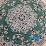 Nain Handwoven Round Rug Green - In-room view showing room styling and scale