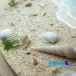 In-room view of Artisan Ocean Wave Resin Wall Clock Yes styling and size reference
