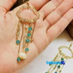 Front view of Handcrafted Pearl and Agate Earrings by Artisan design key details