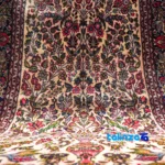 Top view of Persian Handwoven Carpet Qom Floral Design pattern and color tone