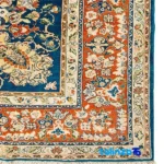 Top view of Traditional Handwoven Carpet Blue Floral Design pattern and color tone
