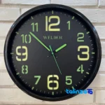 Welder Quartz Wall Clock Night Glow Feature - Front view showing dial layout and markers
