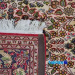 Detail view of Persian Handwoven Carpet Qom Floral Design pile texture close-up