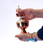 Naser al-Din Shah Brass Oil Lamp - Packaging view showing label and