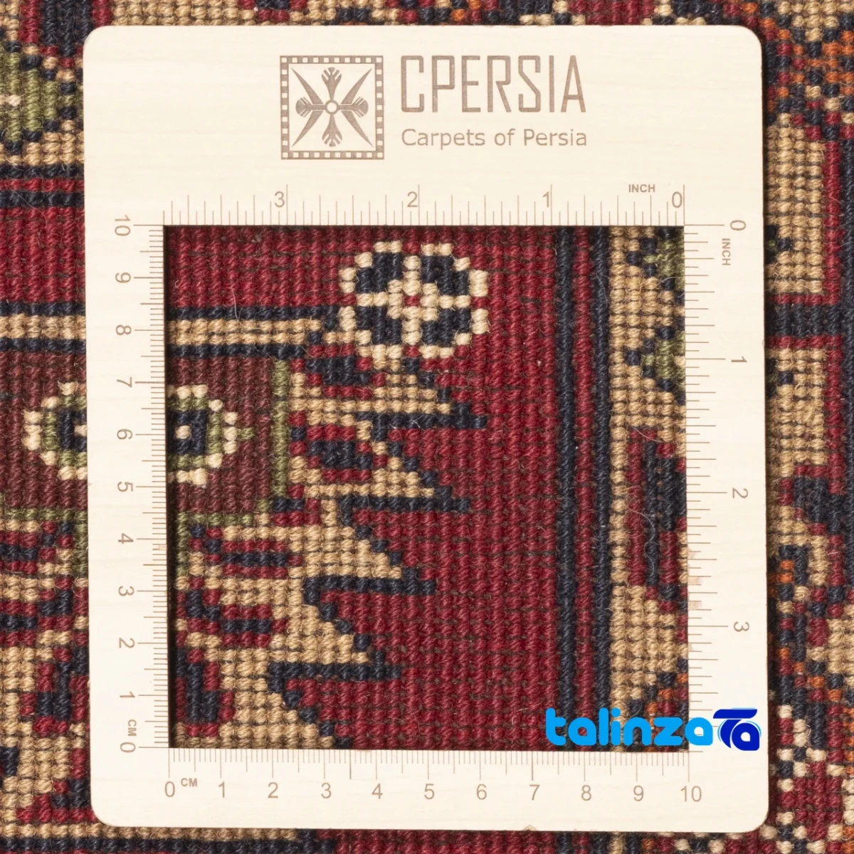 Detail view of C Persia Handwoven Rug - Luxurious Red Design pile texture close-up