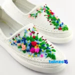 Packaging view of Kerman Beige Cotton Shoes with Embroidery Design label and