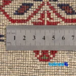 Corner detail of Baloch Handwoven Area Rug - Traditional Design binding and edges