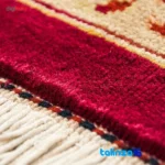 Handwoven Persian Carpet 9 Square Meters Red - Corner detail showing binding and edges