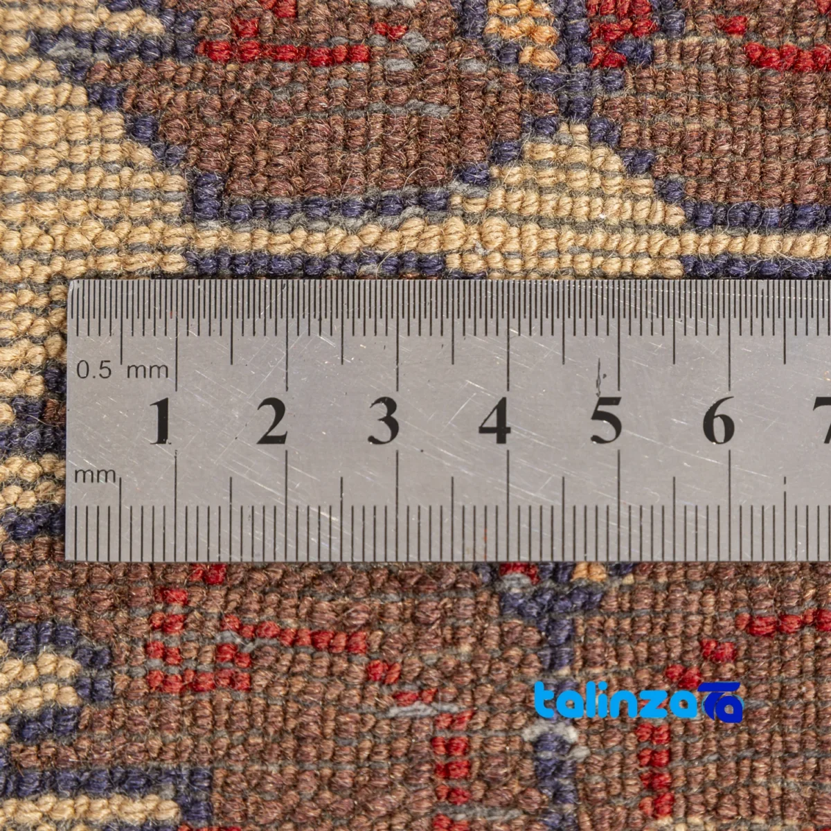 Corner detail of Handwoven Persian Rug Baloch Design Natural Dye Cream binding and edges