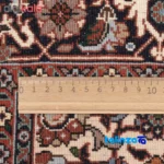 C Persia Handwoven Rug - Elegant Cream Design binding and edges (Corner detail)