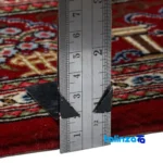 Edge view of Persia Handwoven Rug Blue Traditional Design border and finishing