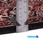 Edge view of C Persia Handwoven Carpet Red border and finishing