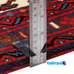 Corner detail of Persia Handwoven Carpet Beige Design 187204 binding and edges