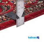 Edge view of Si Persia Handwoven Rug Red border and finishing