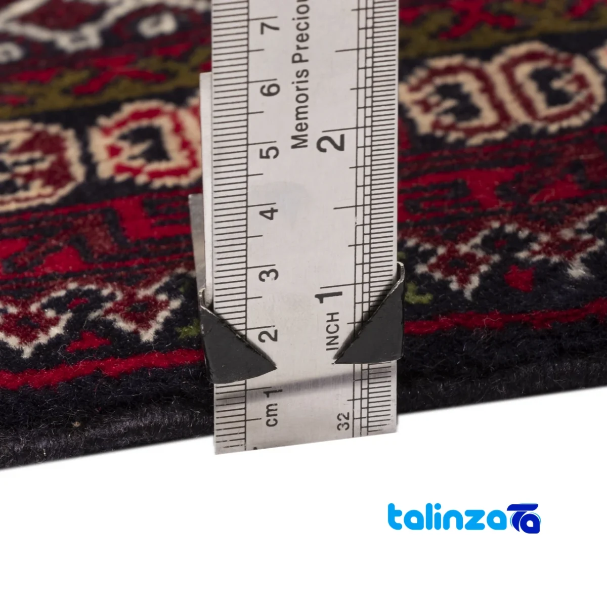 Corner detail of Persia Handwoven Carpet Navy Blue binding and edges