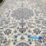 Corner detail of Hirad Handwoven Area Rug Elegant Design binding and edges
