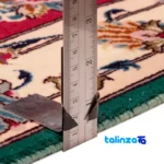 Corner detail of Persia Handwoven Carpet Red Luxurious Design binding and edges