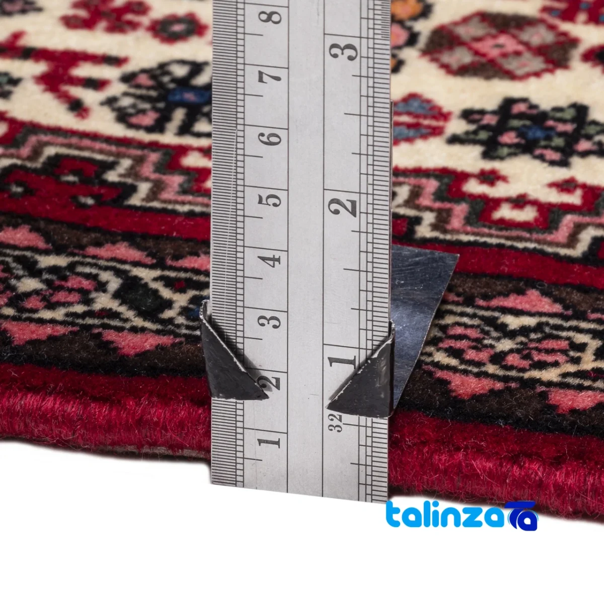 Corner detail of Cypress Persian Handwoven Runner Rug Cream binding and edges