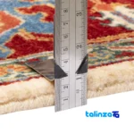 Edge view of C Persia Handwoven Rug Elegant Cream Design border and finishing