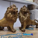 China Bronze Lion Statues Set - Unique Design - Detail view showing finish and material