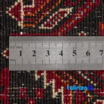 Handwoven Persian Rug Model Baluch - Corner detail showing binding and edges