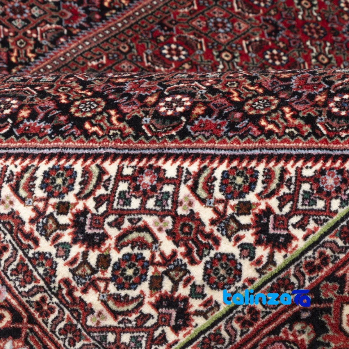 In-room view of C Persia Handwoven Carpet Red room styling and scale