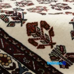 Room setting of C Persia Handwoven Rug Elegant Design floor placement example