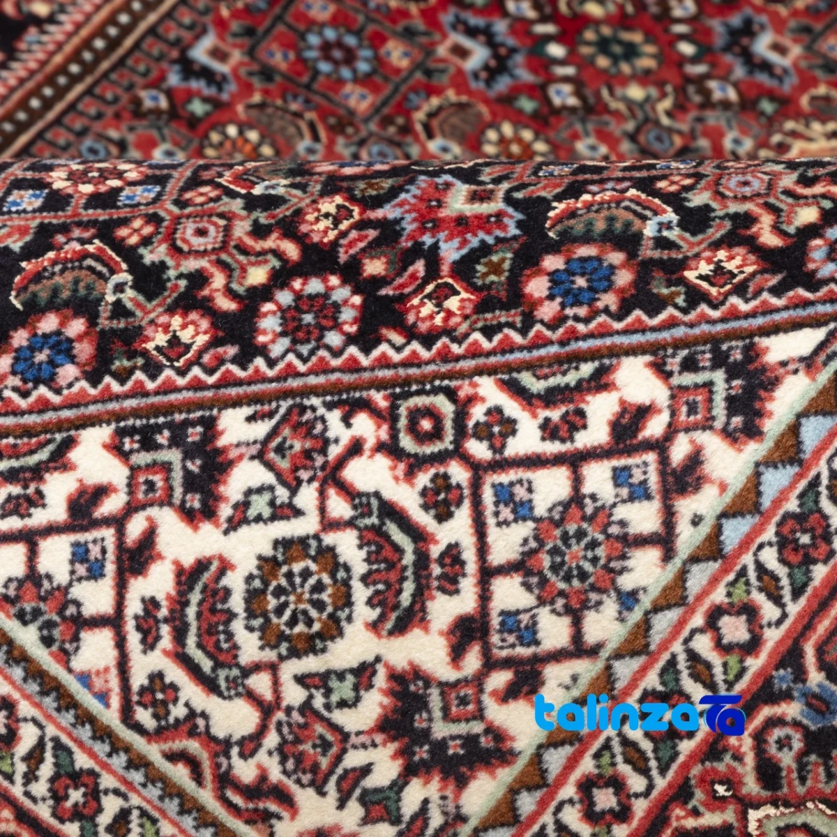 In-room view of Cypress Persian Handwoven Rug Red room styling and scale