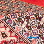 C Persia Handwoven Rug Elegant Design - In-room view showing room styling and scale