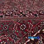 Room setting of C Persia Handwoven Rug Luxurious Design floor placement example