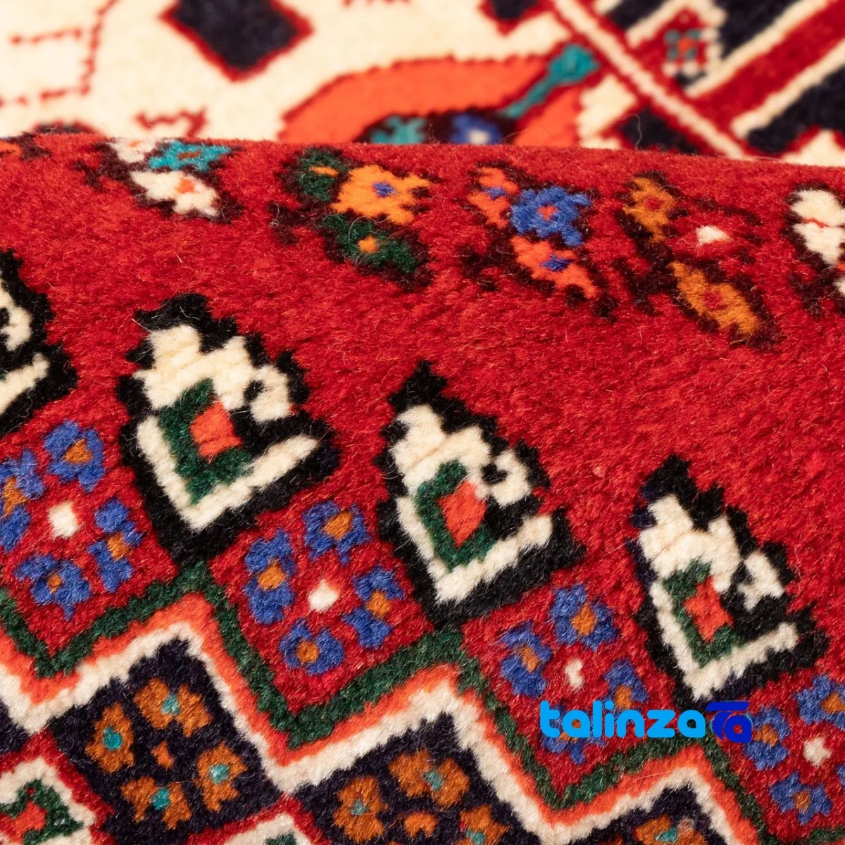 In-room view of Si Persia Handwoven Rug Red room styling and scale