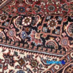 Si Persia Handwoven Carpet Red Design - In-room view showing room styling and scale