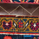Handwoven Persian Rug Geometric Design Red room styling and scale (In-room view)