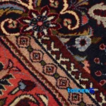 In-room view of C Persia Handwoven Rug Rich Navy room styling and scale