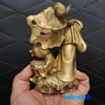 Front view of Bronze Sculpture Two Sisters Lily Design and key details